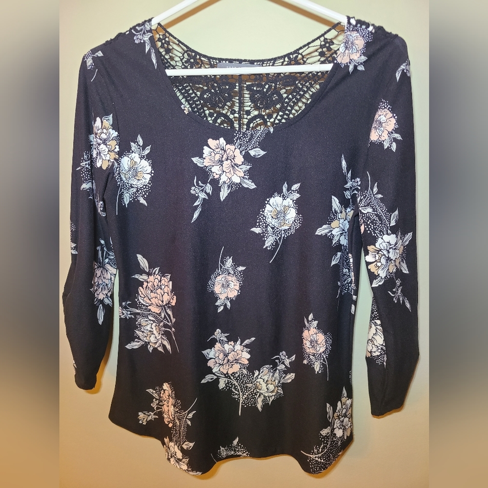 Black floral pullover top with back lace insert